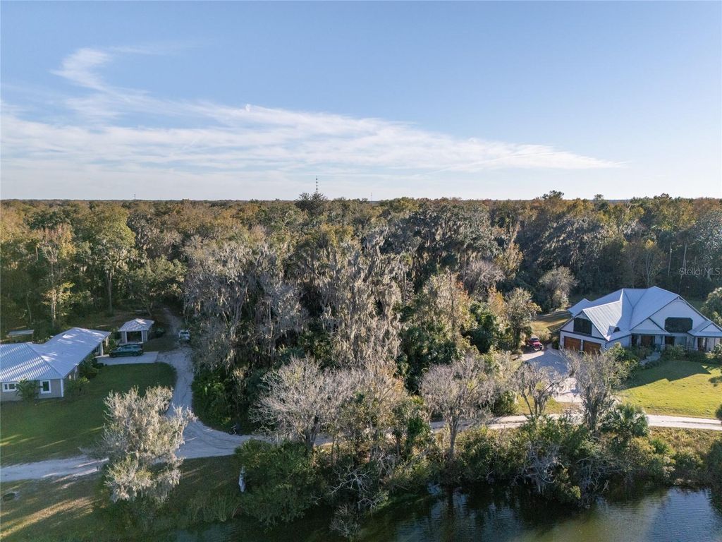 Photo of 2750 Pearl Lake Trail, New Smyrna Beach, FL 32168 (MLS # FC315207)