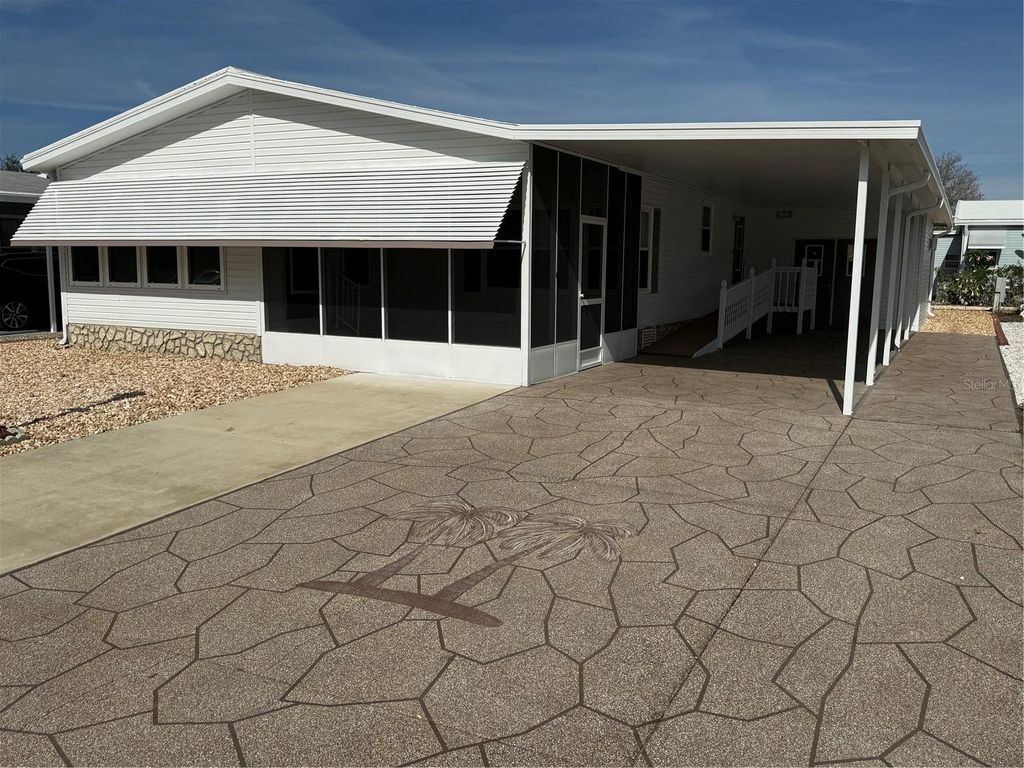 Photo of 153 Nesbitt Park Avenue, Davenport, FL 33897 (MLS # S5141605)