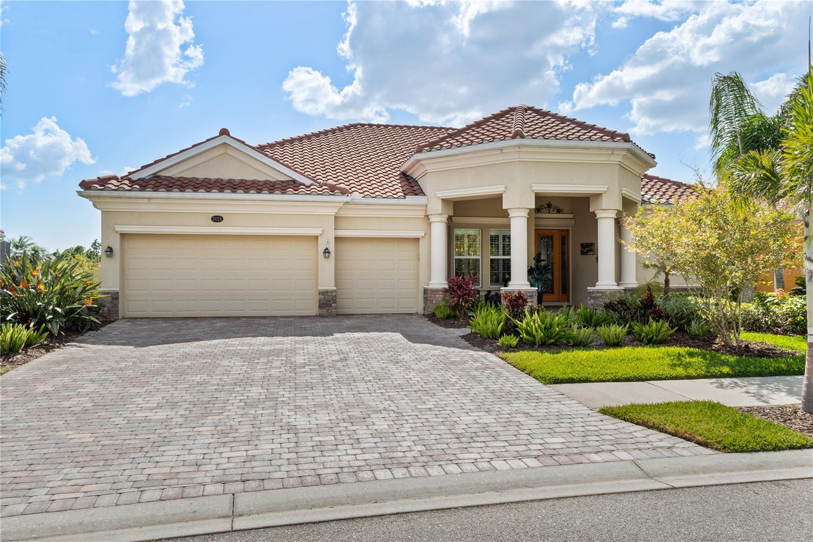 Price Improvement!! THIS IS THE HOME YOU HAVE BEEN LOOKING FOR!! Come enjoy the Florida lifestyle in this immaculately kept 4 bedroom, 3 bath NEWEST built pool home in "2015" with 3 car garage located in the exclusive gated community of Heron Creek Golf and Country Club! This home boasts over 2500 sq feet of living space. This beautiful home features a brick paver driveway leading to charming front porch and leaded glass entry door. Once inside you are greeted by a formal living room complimented by soaring ceilings, crown molding and views to the sparkling pool and lanai area. Adjacent to the formal living room is the light and bright, formal dining room accented with a decorative arch, wainscoting and crown molding. A fabulous environment to enjoy a delicious meal with your family and friends. The kitchen is a chef’s delight with solid wood cabinetry, under and over cabinet lighting, granite counter tops, Stainless Steel appliances with gas cooking, breakfast bar, pendant lighting a huge pantry closet and a very impressive backsplash. Enjoy your morning beverage in the breakfast area while gazing out the aquarium window overlooking the sparkling pool and preserve area…the ideal place to start your day. The enormous great room offers a beautiful coffered ceiling, crown molding and triple sliders out to the lanai/ pool area. Time to relax in your generous size primary suite with your private entrance to the lanai, sitting area, views of the pool and lanai, crown molding, tray ceiling, walk in closet, wood look tile flooring and ensuite bath. The ensuite bath features separate sinks with granite countertops, walk in shower, and soaking tub. This home design is a true split plan with the nice size guest bedrooms on the opposite side of the home providing the ultimate privacy for you and your guests. The guest bedrooms share a bath with a glass enclosed tub/shower combination, solid wood cabinetry and granite counter top. The pool bath includes and walk in shower, solid wood cabinetry and granite counter top. Enjoy the gorgeous sunsets from you brick paver lanai or in the heated pool and spa while sipping on your favorite beverage! This home has lots of extras including plantation shutters, a mix of electric and accordion hurricane shutters, electric awning on lanai, tile on diagonal in the main living areas, huge laundry room with utility sink and storage cabinets and a 3 car garage allowing for plenty of space for all your toys! This home overlooks a preserve in the back and a preserve in the front creating your very own sanctuary. Heron Creek is a very active community with lots of amenities such as, 27 holes Arthur Hills designed golf course, 5 Har Tru lighted tennis courts, fitness center, resort style pool and spa, 20,000 sq ft. Clubhouse offering casual and fine dining, or grab a bite at the newly updated Courtside Cafe. There is always something of interest going on with lots of planned daytime and evening activities. Heron Creek is located close to area beaches, restaurants, shopping, Cool Today Park and Warm Mineral Springs. Now is the time to make this home yours today!