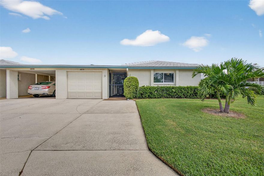 Welcome to Village Green, a highly sought-after 55+ community! This charming 2 bedroom, 2 bathroom condominium offers a bright and open layout with a Florida sunroom that expands the living space and overlooks the beautifully landscaped courtyard. Just steps away from the cluster’s private community pool, this home also features an enclosed carport for added convenience. Perfectly located, you’ll be just a short drive to Anna Maria Island, Coquina Beach, and Holmes Beach, as well as outdoor adventures like hiking, kayaking, and paddle boarding at nearby Robinson Preserve. Enjoy the relaxed Florida lifestyle you’ve been dreaming of!