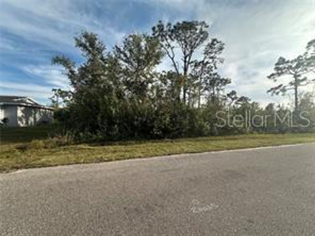 Photo of 12405 Fairwind Avenue, Port Charlotte, FL 33981 (MLS # A4666565)