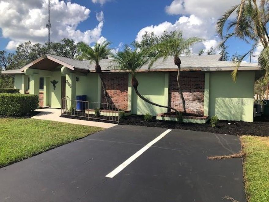This property offers substantial value compared to similar listings in Port Charlotte. Its location, zoning flexibility, parking, and stand-alone status combine to make it a sound investment for owner-occupiers or investors seeking to lease to high-quality tenants. • Owner-Occupied: Control your work environment and build equity in a property tailored to your needs. • Investor Opportunity: Capitalize on the strong demand for medical, office, and institutional space in the area; lease to reliable, long-term tenants. Located across Walmart Neighborhood Market on Tamiami Trail (with a northbound turn lane onto Crestview from Tamiami). The synergy of retail, residential, and professional services creates a dynamic business ecosystem, supporting your operation’s growth and visibility. This property has ample parking behind the building, accessible via Mirado Lane NW, which offers enough spaces for staff, guests, and clients.