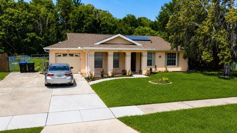 Photo of 707 Iowa Woods Circle E, Orlando, FL 32824 (MLS # S5155631)