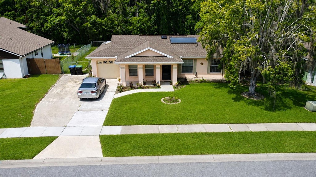 Photo of 707 Iowa Woods Circle E, Orlando, FL 32824 (MLS # S5155631)