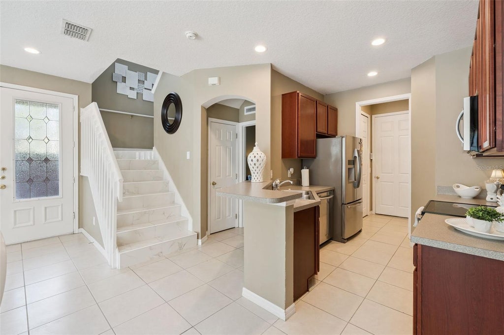 Photo of 7506 Cranes Creek Court #30, Winter Park, FL 32792 (MLS # S5156844)