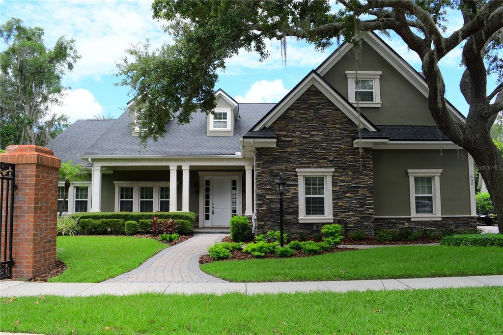 Photo of 450 Harbour Isle, Longwood, FL 32750 (MLS # O6434694)