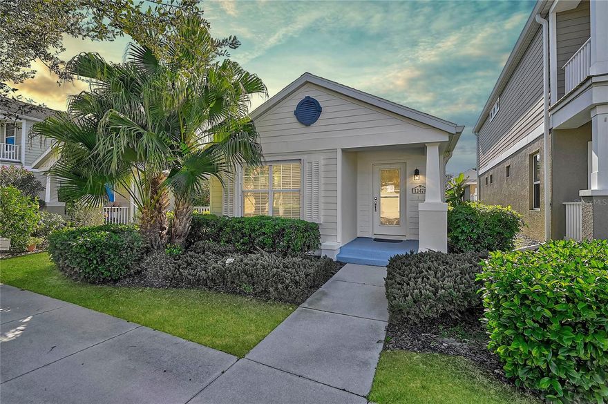 One or more photo(s) has been virtually staged. NEW AND IMPROVED PRICE! Tucked into the heart of Grand Palm, this charming 2-bedroom, 2-bath cottage welcomes you with an easy, effortless lifestyle from the moment you arrive. Sunlight pours through oversized front windows, filling the open living space with warmth and creating the perfect backdrop for everyday living or relaxed entertaining. Updated light fixtures and LED lighting throughout the home enhance the bright, airy feel while adding modern style and energy efficiency. The living room flows seamlessly into the kitchen and dining area which creates an inviting layout designed for connection, comfort, and simplicity. The kitchen is both stylish and functional, featuring a center island, granite countertops, refinished cabinetry, and plenty of workspace for casual meals or quiet mornings at home. The primary suite offers a peaceful retreat with a walk-in closet and an ensuite bath complete with a walk-in shower, while the second bedroom provides privacy for guests or a home office. Designed with ease in mind, this one-level home is ideal for those seeking low-maintenance living, making it perfect for a single homeowner, a retired couple, or anyone ready to simplify without sacrificing quality. Thoughtful upgrades add peace of mind, including a new HVAC system, new water heater, new washer and dryer, refinished cabinetry throughout, a freshly epoxied garage floor, and hurricane shutters for easy storm preparation. Meticulously maintained and truly move-in ready, this home shines both inside and out. Beyond the front door, Grand Palm offers a resort-inspired lifestyle surrounded by nature. Start your mornings on miles of scenic walking and biking trails winding through lakes and preserves, spend afternoons by the lagoon-style pools or enjoying pickleball and bocce, and wind down with neighbors at community events, food truck nights, and holiday gatherings. With a fitness center, dog parks, social clubs, and year-round activities, it’s easy to feel connected here yet peaceful enough to feel like a getaway. Just minutes from downtown Wellen Park, shopping, dining, and Gulf Coast beaches, this home delivers the perfect blend of comfort, community, and convenience. Welcome home to Grand Palm, where life feels lighter, slower, and just a little more joyful. ¤ Please see 3D Tour and Video ¤