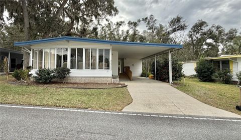 Photo of 211 Aspen Circle, Leesburg, FL 34748 (MLS # G5106873)