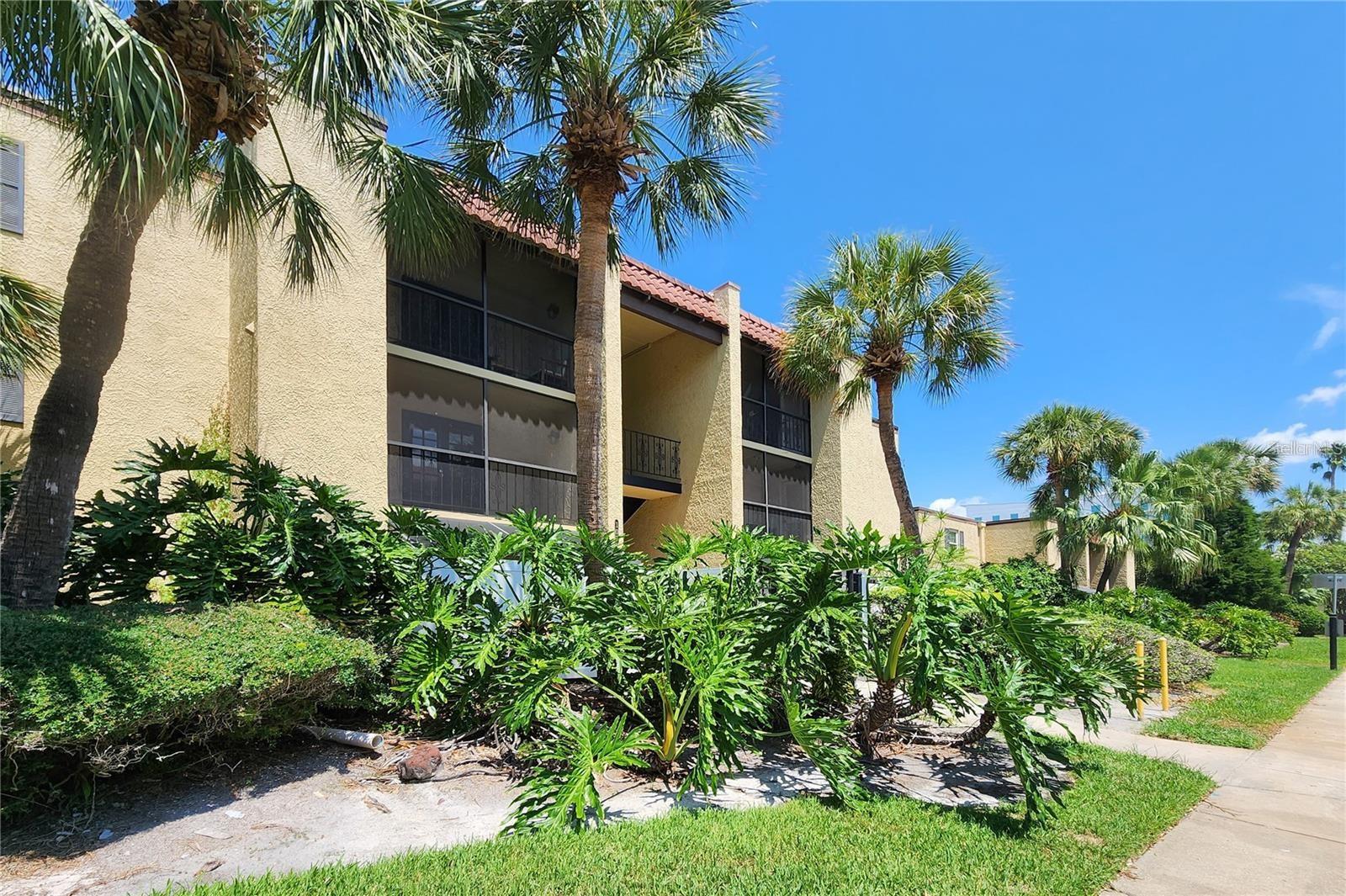 Welcome to this beautifully maintained 2-bedroom, 2-bathroom condo in the highly sought-after Grady/Coleman/Plant school district! Ideally situated on the second floor, this residence offers an open-concept layout that seamlessly blends the living room, dining area, and kitchen - complete with newer appliances including a refrigerator, microwave, and range. Neutral tones throughout the home create a warm and welcoming atmosphere, while French doors in the living room lead to a screened-in balcony are perfect for relaxing outdoors. The balcony also houses a private laundry area and a convenient storage closet. The spacious primary suite features a large walk-in closet with brand-new built-ins and an en-suite bathroom with a separate vanity area. The second bedroom is located just across the hall from the second full bathroom, providing privacy and functionality for guests or roommates. Residents of this secure, gated community enjoy a wide range of amenities, including a swimming pool, fitness center, clubhouse, community room, car wash area, and a dog park - offering plenty of ways to unwind and connect with neighbors. Perfectly positioned near Westshore Mall, Tampa International Airport, Downtown Tampa, the Westshore Business District, and major highways, this condo offers unbeatable access to top dining, shopping, entertainment, and beautiful Gulf Coast beaches.