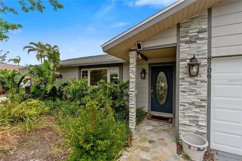Photo of 6706 22nd Avenue W, Bradenton, FL 34209 (MLS # A4702787)