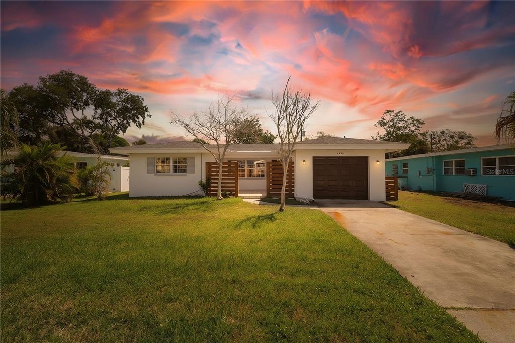 Photo of 2491 Coronado Way, Dunedin, FL 34698 (MLS # O6374520)