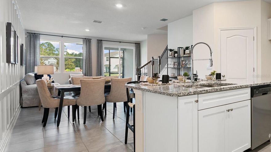 Under Construction. The Harper is an incredible 2-story townhome with 1,722 square feet, 3 bedrooms, and 2.5 bathrooms. The open concept layout includes a spacious kitchen and airy living room. The kitchen features a large island where homeowners will enjoy preparing meals while entertaining family and friends. Enjoy warm summer evenings on your covered back lanai located just off the living room. The main suite has a spacious bathroom with vanity and walk-in closet. Laundry is also located upstairs for easy access. Plus, you will never be too far from home with Home Is Connected.®