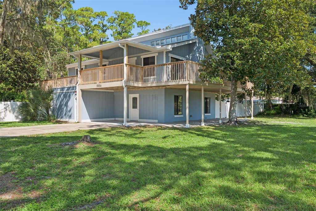 Photo of 5556 S Lancewood Circle, Port Orange, FL 32127 (MLS # O6431372)