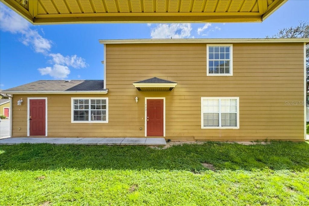 Photo of 732 Washington Palm Loop, Davenport, FL 33897 (MLS # O6442506)