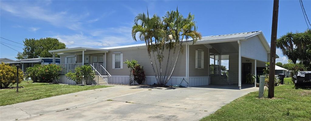 Photo of 2125 SE 35th Lane, Okeechobee, FL 34974 (MLS # OK225346)