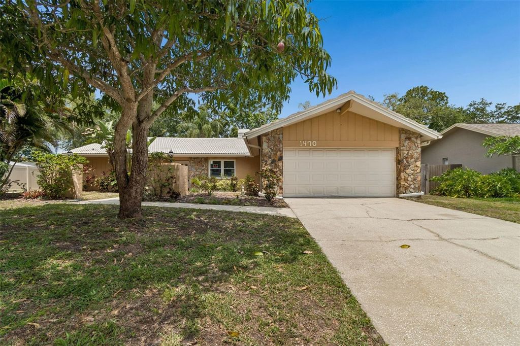 Photo of 1470 Burnham Lane, Dunedin, FL 34698 (MLS # TB8502300)