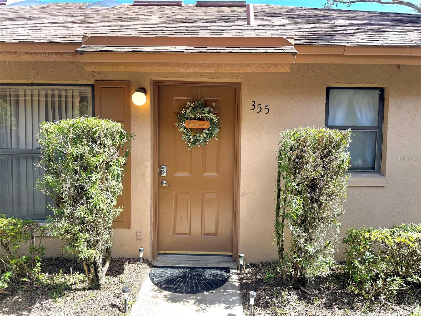Vaulted ceilings in the great room & kitchen, along with a skylight make this 2 bedroom 2 bathroom condominium Light, Bright & Inviting. Located in a quiet community this end-unit is move-in ready and can be available for quick closing and occupancy. New paint throughout. Kitchen has new kitchen cabinet doors, stainless steel appliances & newer (2022) Dishwasher. Screened patio is larger than most in the community & has a small storage closet. The master bedroom features a walk-in-closet and private full bathroom. 2 assigned parking spots, community swimming pool, exterior maintenance and landscaping are included in the monthly HOA fee. This community is near charming downtown Winter Garden known for it's Farmer's Market, restaurants, shopping, access to the West Orange Trail, minutes from baseball fields and pickleball courts, and convenient to Hwy 50, the Florida Turnpike, and SR 429.
