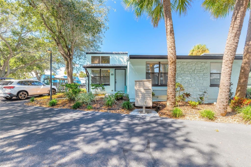 Photo of 42 Jacaranda Cay Court #42, New Smyrna Beach, FL 32169 (MLS # NS1089504)