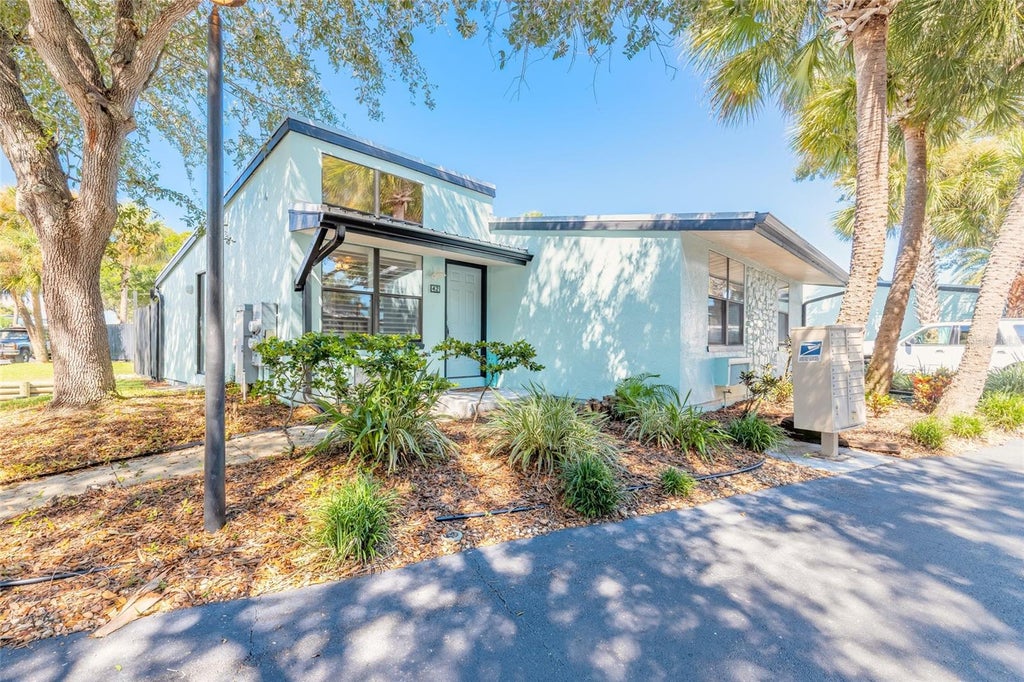 Photo of 42 Jacaranda Cay Court #42, New Smyrna Beach, FL 32169 (MLS # NS1089504)