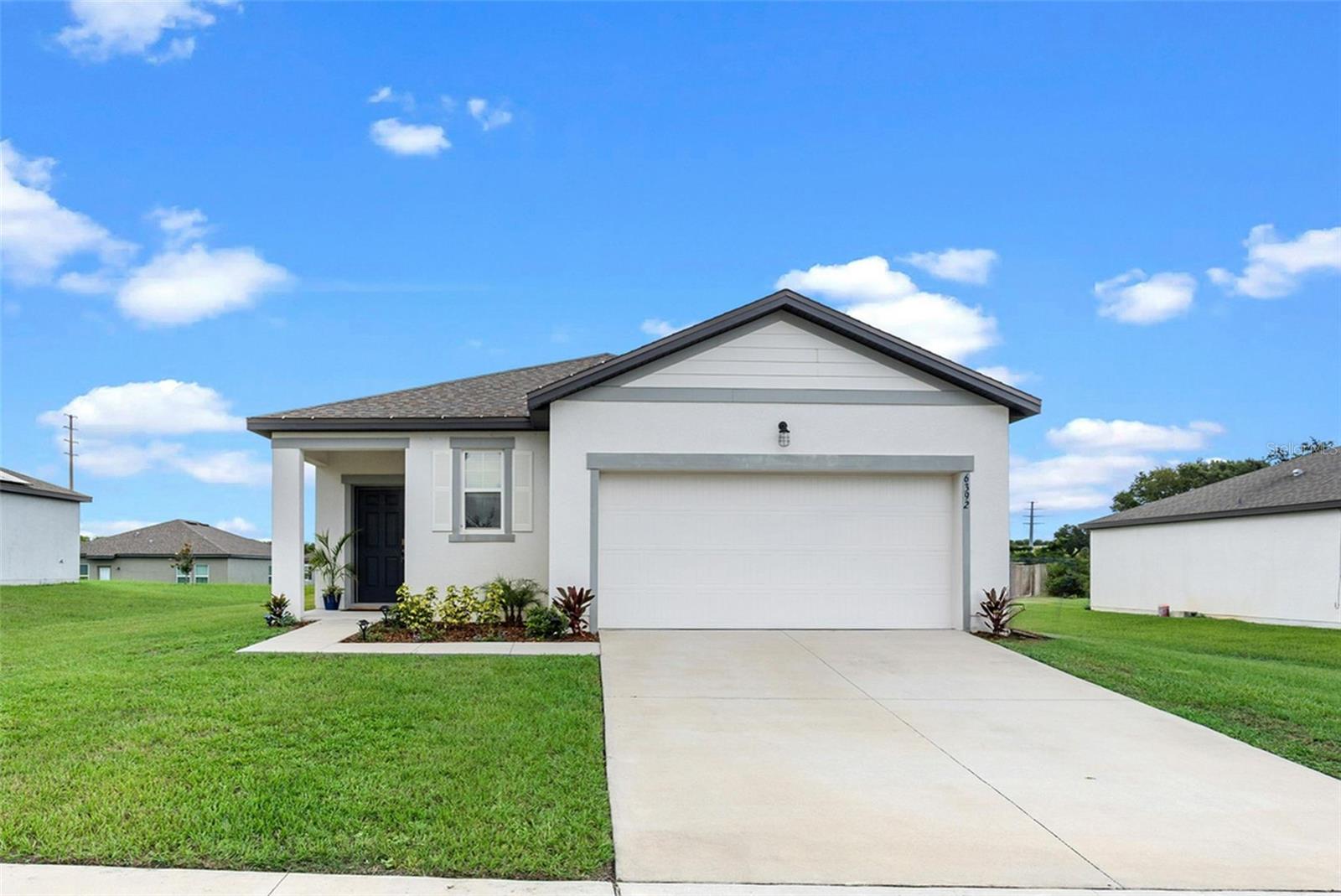 Charming One-Story Home on Oversized Lot | Updated Features | Prime Location Near Orlando
Welcome to your beautifully maintained, one-owner home nestled on the peaceful outskirts of Orlando! Situated on a spacious oversized lot, this inviting property offers the perfect blend of modern upgrades, comfort, and outdoor living—with luxury vinyl plank flooring (2022) throughout, abundant natural light, and an ideal split floor plan designed for privacy and ease.
As you enter, you're welcomed by a bright and open-concept layout that flows seamlessly from the living room to the dining area and kitchen—perfect for hosting or relaxing with loved ones. The kitchen is centrally located, allowing you to stay connected to your guests while enjoying views of your expansive backyard.
Step outside to your covered, screened-in patio (2024) that leads to an extended paver patio (2024)—ideal for entertaining year-round. Gather around the custom fire pit (2020) for cozy evenings, barbecues, and old-fashioned conversations under the stars.
The private primary suite is located in the back corner of the home and features a large walk-in closet, a stand-up shower, and a linen closet. Two additional bedrooms and a full bath with a tub/shower combo are located down the hall—perfect for guests or family.
Additional features include a bright indoor laundry room with a window and shelving for storage, and a convenient drop zone off the garage for everyday essentials.
Enjoy peaceful living with easy access to major conveniences. You're just minutes from downtown Groveland and Clermont, with quick access to the Turnpike, shopping, dining, Disney, world-class golf, theme parks, and scenic lakes.
This move-in-ready home combines thoughtful upgrades, a prime location, and relaxed Florida living. Schedule your private tour today—this one won’t last!