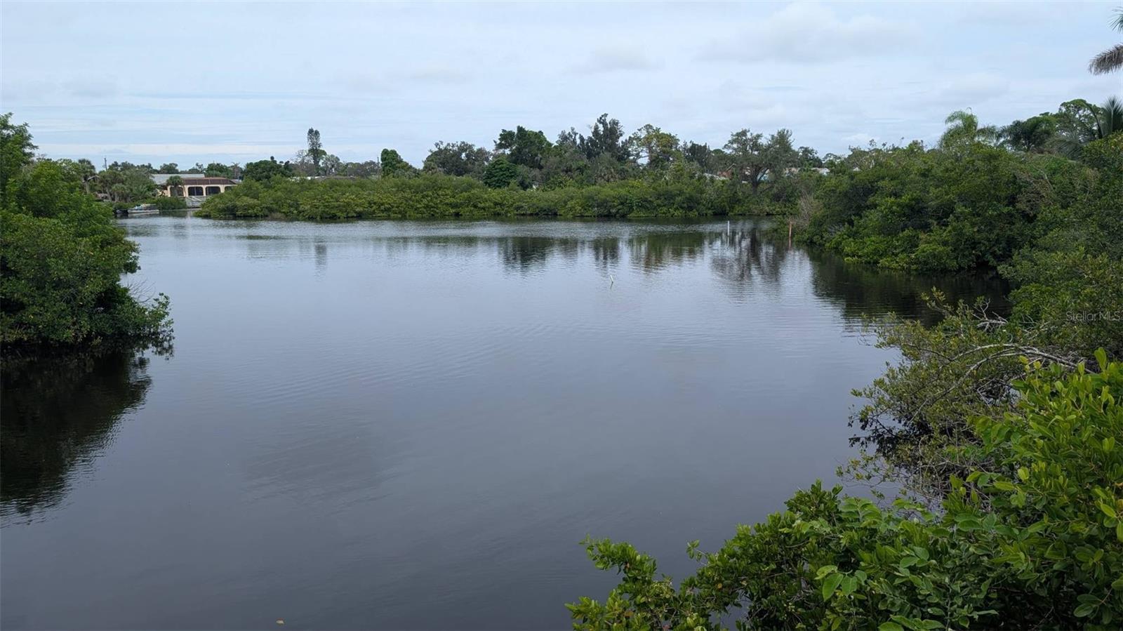Waterfront Lots with Gulf Access – Build Your Dream Home,
Two spacious lots (80x161 combined) being sold together, offering the perfect opportunity to build your new waterfront home in the desirable community of South Venice.
Enjoy direct access to a quiet creek lined with mangroves, perfect for canoeing, kayaking, or fishing. From your backyard, you’ll have boat access to the Intracoastal Waterway (just 1.1 miles) Clearance under the bridge is 7 ft.   This rare property combines privacy, nature, and waterfront living with close access to Gulf of Mexico—don’t miss the chance to create your dream home here!
The South Venice Community also features its own area boat ramp, and access to a half-mile private community beach via ferry, as well as a kayak/canoe/paddle-board launch area for a small yearly fee. No HOA or CDD fees. Located just a short distance from the famous Legacy Trail for biking.  Close by the Venice Yacht Club and the charming downtown area of Venice, with its shopping and dining options. If you are a boater and love to be close to the water, this lot is place to build your dream home!!!
