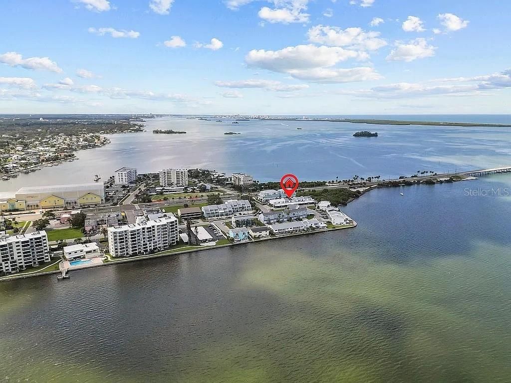 Photo of 210 Bunker Hill Lane, Dunedin, FL 34698 (MLS # O6348175)