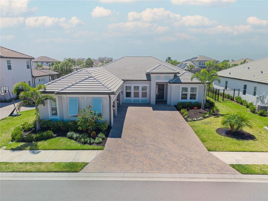 Photo of 6172 Lungo Lago Drive, Sarasota, FL 34241 (MLS # A4665892)