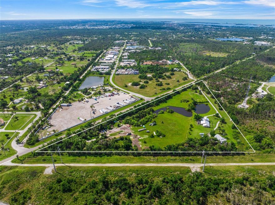 Featuring 1,700 feet of road frontage on River Rd, this triangular-shaped 17.4-acre development site is located within Sarasota County, Florida's unincorporated area. Currently zoned OUE1 (Open Use Estate, 1 unit / 5 acres), the property includes two structures—one occupied by a residential tenant and the second unoccupied. The site consists of two PID numbers: one with 370,260 sf (8.5 acres) and the second one with 387,684 sf (8.9 acres). Situated at the south end, just outside The West Villages Improvement District, the district has the authority to plan, finance, construct, operate, and maintain public infrastructure within Wellen Park. This district spans 12,444 acres within the city of North Port and unincorporated Sarasota County, featuring residential neighborhoods, commercial centers, and the Atlanta Braves' spring training stadium. It also includes the soon-to-be-completed Downtown Wellen. The property is adjacent to the Englewood Sports Complex, one of Sarasota County's premier locations, offering various outdoor amenities, including little league fields, soccer fields, tennis courts, hiking trails, picnic facilities, and more.