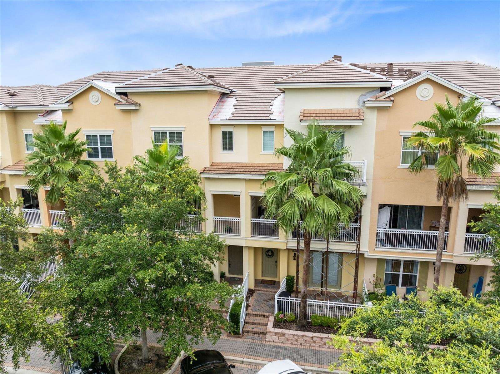 One or more photos have been virtually staged.
Welcome to luxury living in the prestigious Grande Oaks at Heathrow, one of Lake Mary’s most sought-after gated communities!
This stunning 3-bedroom, 3.5-bathroom townhome spans three thoughtfully designed stories and offers 2,187 square feet of stylish, low-maintenance living.
As you step inside, you're greeted by a versatile bonus room on the first floor—perfect for a home office, media room, or guest suite—complete with a full bathroom and access to the oversized 2-car garage with rear entry.
The second level impresses with its expansive open-concept layout that seamlessly connects the Great Room, dining area, and gourmet kitchen—ideal for entertaining. The chef’s kitchen boasts high-end stainless steel appliances, rich granite countertops, recessed-panel cabinetry with abundant storage, a generous walk-in pantry, and a large center island perfect for casual dining. Step out onto the private balcony and enjoy tranquil lake and pool views—a perfect setting for your morning coffee or evening unwind.
All three bedrooms are located on the third floor, including a spacious primary suite with a luxurious en suite bath and a large walk-in closet. Two additional bedrooms share a full bath across the hall, where you’ll also find a laundry closet with washer and dryer, plus a convenient linen closet.
Stylish finishes throughout include tile flooring on the first two levels and luxury vinyl plank in all bedrooms. A charming front porch adds to the curb appeal and welcomes you home.
Grande Oaks at Heathrow offers resort-style amenities including a sparkling pool, fitness center, and scenic walking paths. Enjoy unmatched convenience with close proximity to I-4 and SR-429, putting you just minutes from top-rated schools, upscale shopping, dining, entertainment, downtown Orlando, major theme parks, Orlando International Airport, and Florida’s world-famous beaches.
Don’t miss this opportunity to live in one of Central Florida’s premier communities—schedule your private tour today and discover the perfect blend of elegance, comfort, and location!