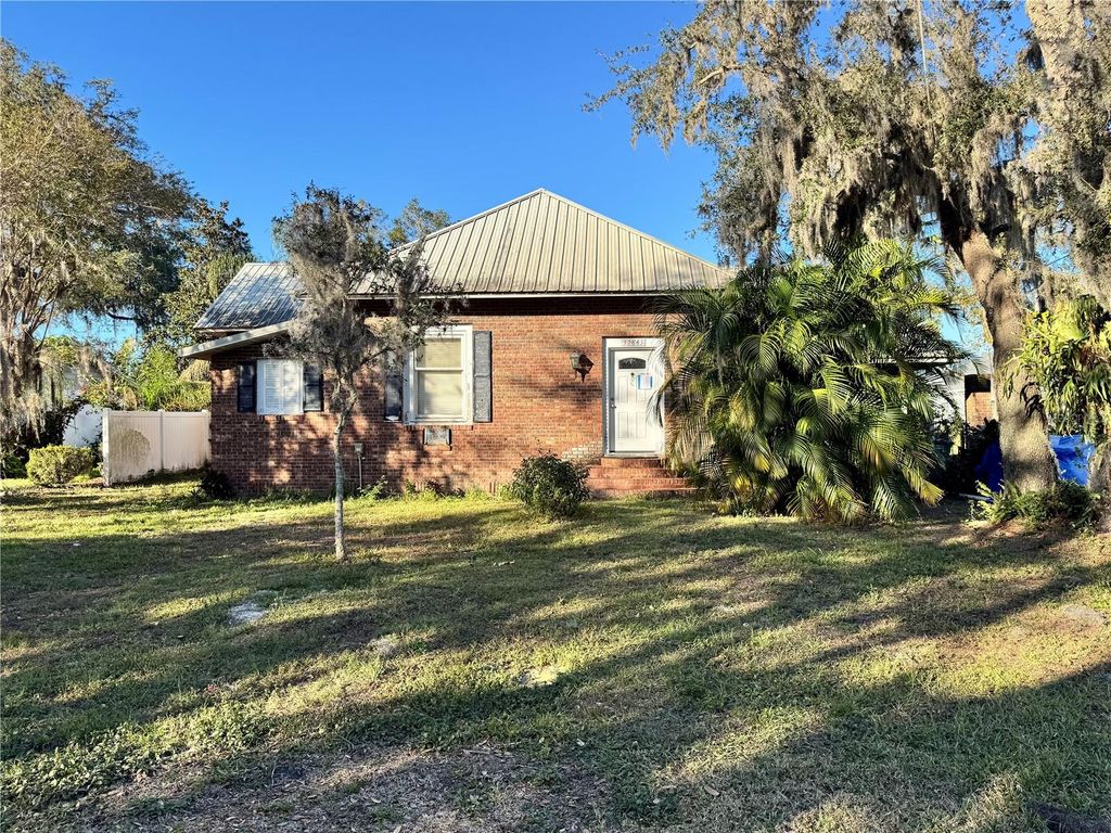 Photo of 32843 Michigan Avenue, San Antonio, FL 33576 (MLS # J985487)