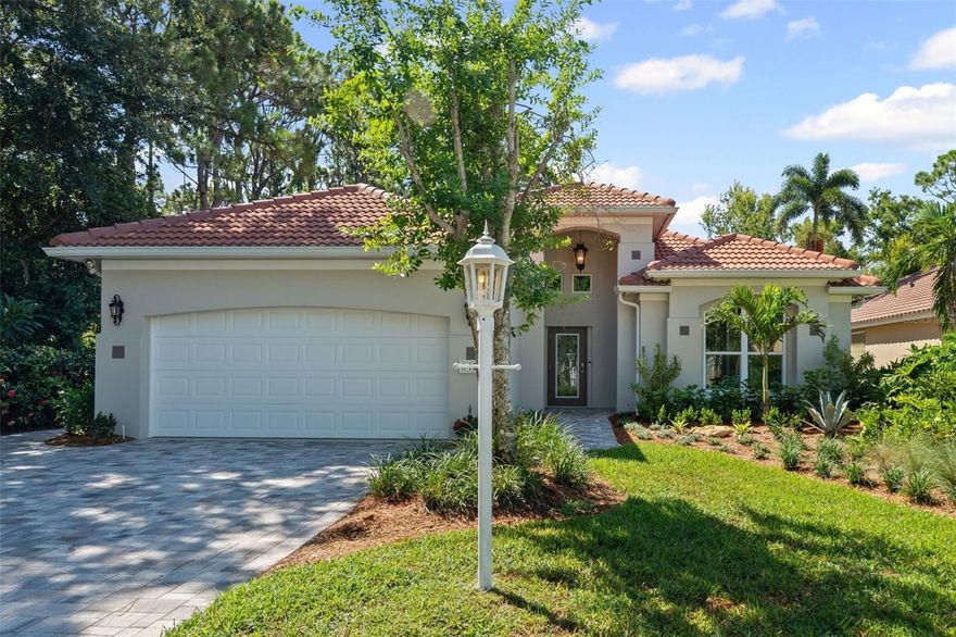 Completely renovated in 2023 to the utmost standards, this luxury pool home is better than today’s new builds. From top to bottom, you’ll notice the difference. On the exterior, enjoy peace of mind with the new roof, impact resistant windows and doors, impact resistant garage door, fresh paint, and whole house generator. New pavers, landscaping and outdoor lighting set the tropical ambiance. The sparkling pool, with a new heater and pool tiles, and the outdoor kitchen invite you to relax and entertain in true Florida style. On the inside you’ll find new tile floors and baseboards, Hunter Douglas shades, new outlets, switches, lighting fixtures, exhaust fans, ceiling fans, and a new HVAC system. No detail has been overlooked. This pristine home boasts a chef’s kitchen with Cambria quartz countertops, soft-close cabinetry, and GE Cafe and Wolf appliances. Everything in the kitchen and in both baths has been fully renovated with the highest quality materials and finishes. The open floor plan and soaring ceilings in this spacious home maximize the abundant natural light and provide multiple views of the inviting pool and lush landscaping. Located on a quiet cul-de-sac in Hampton Green, a subdivision within the coveted University Park Country Club, HOA dues cover the landscaping as well as high speed fiber-optic cable and internet in the homes. University Park Country Club is a gated master planned community with 27 holes of four-star rated golf, a full-service restaurant and bar, state of the art clubhouse and fitness center, pickleball and tennis courts.