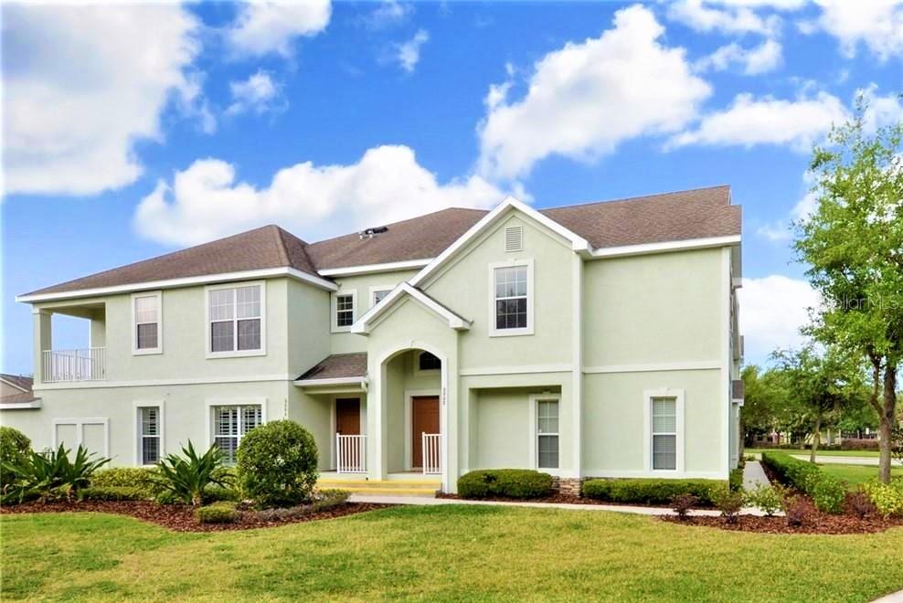 **THE BUILDERS FORMER MODEL**FISHHAWK LUXURY CONDO FEATURING a 2 CAR GARAGE and GORGEOUS UPGRADES!**MAINTENANCE FREE / RESORT STYLE LIVING! All of the Bells and Whistles you would expect to find in a MODEL HOME! Complete w/ Artisan Balconies overlooking Park Square & Cross Park! Featuring 2 MASTER SUITES, Each with it’s own En-Suite FULL Bath, PLUS A OPEN LOFT/ BONUS AREA with a Closet....an Impressively Fabulous layout! Enter to soaring ceilings and an abundance of natural light throughout! Model Home Appointments such as stone counters in the kitchen and bathrooms, complete with under mount sinks. Real Wood 42" upper cabinets with crowns w/ rope trim. Stainless steel appliances. Recessed lighting, Large 17X17 tile in kitchen, laundry room, bathrooms, foyer, family room, Upgraded lighting, ceiling fans, rounded drywall corners, *PLANTATION SHUTTERS* and art niches. Alarm system pre-wire. built in entertainment center and More. A Gorgeous Contemporary Condo with a 2 Car Garage! ******Recent Upgrades and Special Features include - All NEW APPLIANCES 2020, NEW HOT WATER HEATER 2021, NEW A/C with DUAL THERMOSTATS 2021, NEW LIGHT FIXTURES 2021, NEW DISPOSAL 2023, AND MORE!! Commercial Grade Constructed with Concrete interior walls and 7 inch THICK concrete floors! A SERIOUS MUST SEE In the Heart of Phase II - Walking or Biking to School, 30 Miles of Paved Trails, COMMUNITY POOLS, Fitness Centers, Tennis Courts, Basketball Courts, The Aquatic Club, the Outdoor Living at Park Square and So Much More. YOU WILL ENJOY ALL RESORT LIVING in FISHHAWK RANCH just a short drive to MacDill AFB, Tampa, Orlando, Golf Courses and Sugar Sand, World Class Beaches.