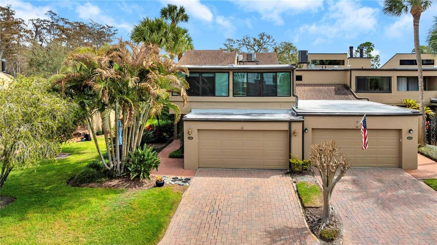 Enjoy stunning golf course and water views from both the downstairs living areas and the spacious primary bedroom in this beautifully maintained 3-bedroom, 2.5-bath home. A striking double-entry glass front door welcomes you into a light-filled interior designed for comfort and style.

The living room features a cozy fireplace, perfect for relaxing or entertaining, while the kitchen offers solid surface countertops and all appliances convey. The washer and dryer also convey, adding convenience and value. All bathrooms have been tastefully updated with modern finishes.

The primary suite is a true retreat, showcasing breathtaking views, a large walk-in closet, dual sinks, and an oversized walk-in shower. Additional highlights include hurricane impact windows for peace of mind, a dedicated laundry room with laundry tub, and a spacious 2-car garage. The home also features a pavered entry, enhancing curb appeal and providing a warm, inviting welcome.

This exceptional property combines beautiful views, thoughtful updates, and everyday functionality—an opportunity you don’t want to miss.