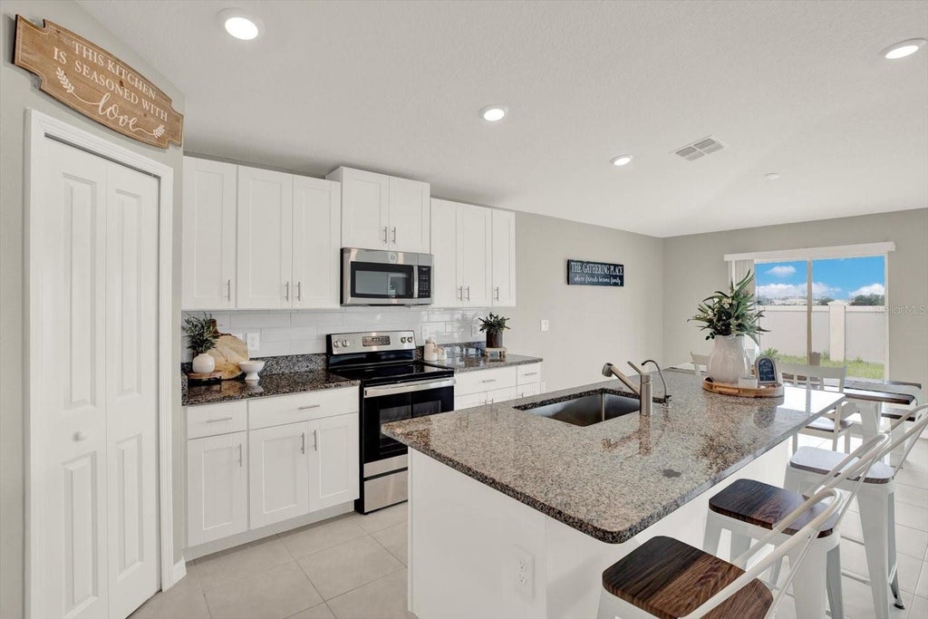 Photo of 11205 Linden Depot Road, San Antonio, FL 33576 (MLS # TB8555118)