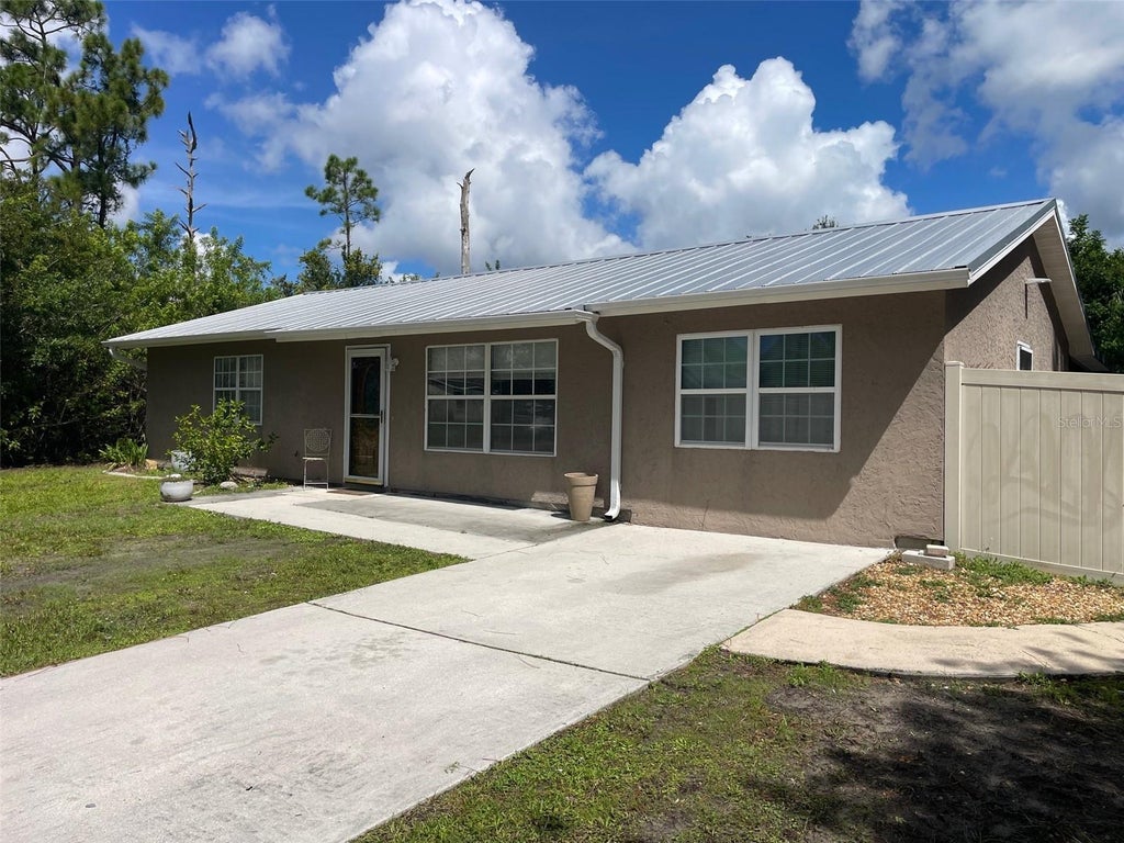 Photo of 23320 Van Buren Avenue, Port Charlotte, FL 33980 (MLS # C7529740)