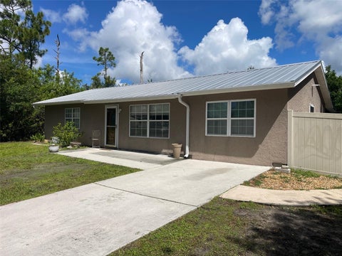 Photo of 23320 Van Buren Avenue, Port Charlotte, FL 33980 (MLS # C7529740)