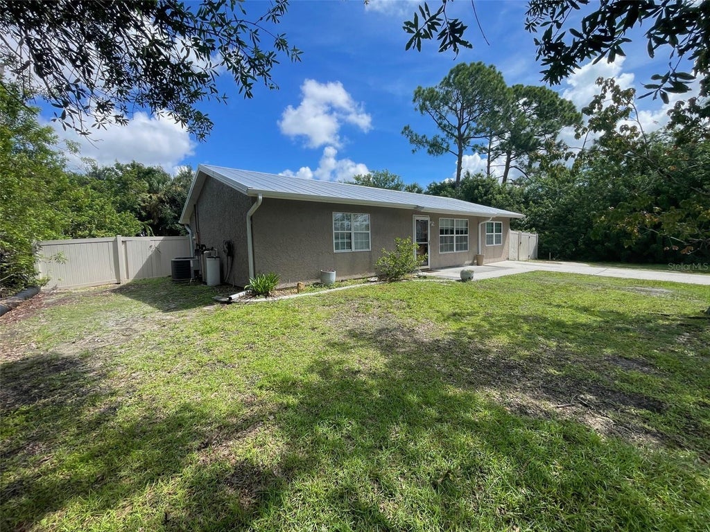 Photo of 23320 Van Buren Avenue, Port Charlotte, FL 33980 (MLS # C7529740)