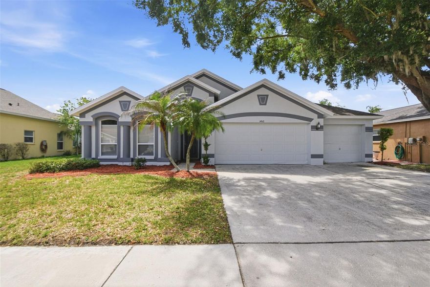 One or more photo(s) has been virtually staged. Beautifully maintained single-story home located in the highly sought-after Wesley Chapel area. This residence offers a spacious and functional layout featuring multiple living and dining areas, ideal for both everyday living and entertaining. The kitchen is well-positioned at the heart of the home, providing ample cabinet space and a seamless flow into the main living area. The primary suite offers a private retreat with an en-suite bath and generous closet space, while secondary bedrooms are comfortably sized. Step outside to enjoy a screened patio and private backyard, perfect for relaxing or hosting gatherings. Conveniently located near shopping, dining, top-rated schools, and major roadways, this home offers both comfort and accessibility.