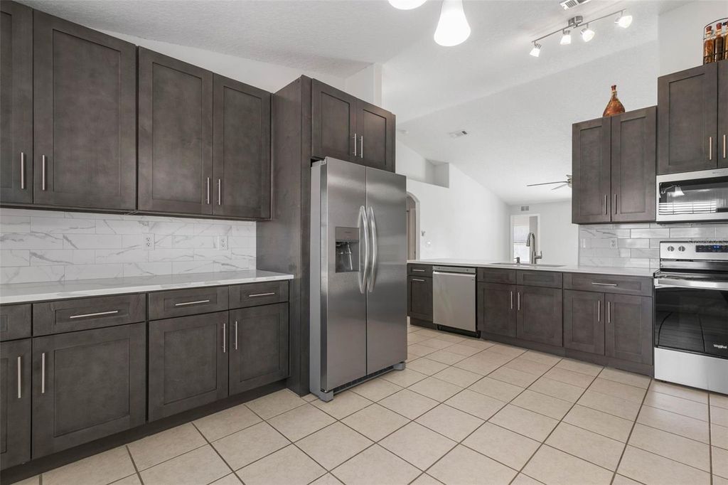 Photo of 9 Firethorn Lane, Palm Coast, FL 32137 (MLS # FC317793)