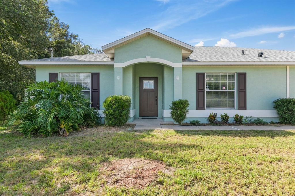 Photo of 9 Firethorn Lane, Palm Coast, FL 32137 (MLS # FC317793)