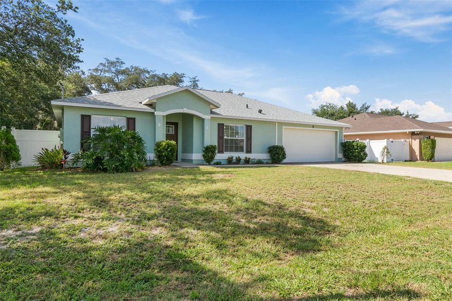 Location, Location Location ! This 4 bedroom / 2 bath/ 2 car garage home is within walking distance to Matanzas High School located in sought-after F section of Palm Coast. Situated on an oversized lot 80x161x82x143- this home offers a magnificent spacious backyard.  Recently remodeled floors, kitchen and baths. A NEW ROOF installed May 2022 and NEW HVAC 2019. High vaulted ceiling and an open floor plan that seamlessly connects a spacious eat-in kitchen to a great room. New kitchen cabinets and beautiful quartz counter-tops , newer Stainless Steel appliances, decorative tile back-splash, pantry and plenty of counter space for all your culinary needs. Split Floor plan ensures privacy for master and quests bedroom. The master bedroom offers new floors, trey ceiling with crown moldings, a large walk in closet and an ensuite bath with new dual vanities, quartz counter-tops and nice tiled walk in shower. The additional three bedrooms are generously sized. Step outside to an expansive concrete patio ready to be screened or even add more living space. The oversized fenced backyard offers privacy and plenty of space for outdoor activities, family gatherings, barbecuing, or simply unwind and enjoy Florida outdoor living and gardening. Plenty of room for a pool. Nice spacious shed for addiotional storage. the garage features a wall mounted AC and garage door opener. This home is located close to shopping , medical, and a short 15 minute dive to the Atlantic Beaches , 20 minutes to Flagler Beach. Very quick and easy access to interstate 95 for an easy commute North to Saint Augustine or South to Daytona Beach.  Near By walking/ Jogging Trails! Do not miss this opportunity!
