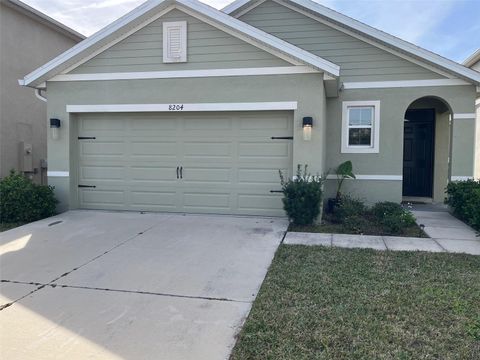 Photo of 8402 Pelican Reed Circle, Wesley Chapel, FL 33545 (MLS # TB8463805)