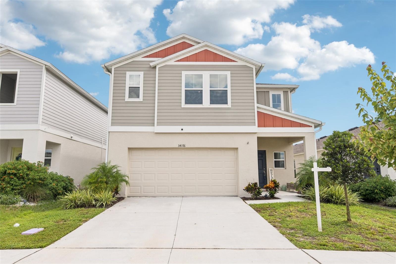 Welcome to this beautifully designed 5-bedroom, 3-bath home built in 2023 and located in a desirable new home community off Overpass Road in Wesley Chapel. This residence offers a thoughtful layout, modern finishes, and an ideal blend of comfort and convenience.
The first floor features an open-concept living area filled with natural light and a seamless flow between the kitchen, dining, and gathering spaces. A private guest suite with a full bath is tucked away for added privacy. Upstairs, a spacious recreation loft offers plenty of flexibility, whether used as a media room, home office, or lounge.
The kitchen is a true highlight, showcasing white cabinetry, elegant grey quartz countertops, and stainless-steel GE appliances, including a refrigerator. Grey-toned, wood-look flooring enhances the modern coastal feel while providing durability and style. The primary suite offers a serene retreat with a walk-in shower, dual vanities, and an oversized walk-in closet.
Additional details include granite and quartz countertops throughout, a washer and dryer, and thoughtfully selected finishes that bring a touch of sophistication to every room.
Outside of the home, residents enjoy access to everything Wesley Chapel has to offer, with abundant shopping, dining, and recreational opportunities just minutes away. This property combines fresh design with a highly sought-after location, making it an excellent choice for today’s lifestyle.