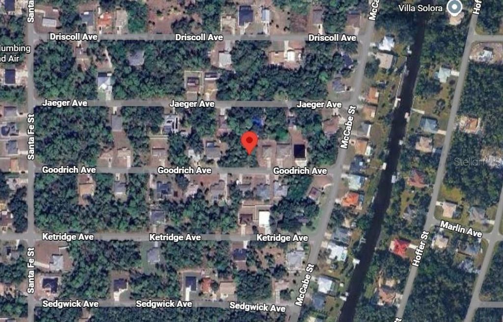 Photo of 13550 Goodrich Avenue, Port Charlotte, FL 33953 (MLS # TB8475509)