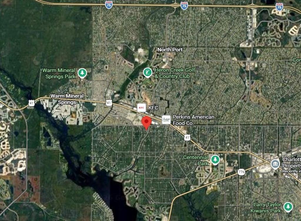 Photo of 13550 Goodrich Avenue, Port Charlotte, FL 33953 (MLS # TB8475509)
