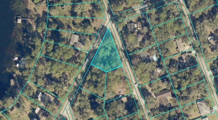 Situated across from Crystal Lake in Ocklawaha, Florida, this lovely lot is ready for you to construct your own home.Check out a peaceful location with beautiful views that is ideal for investors.