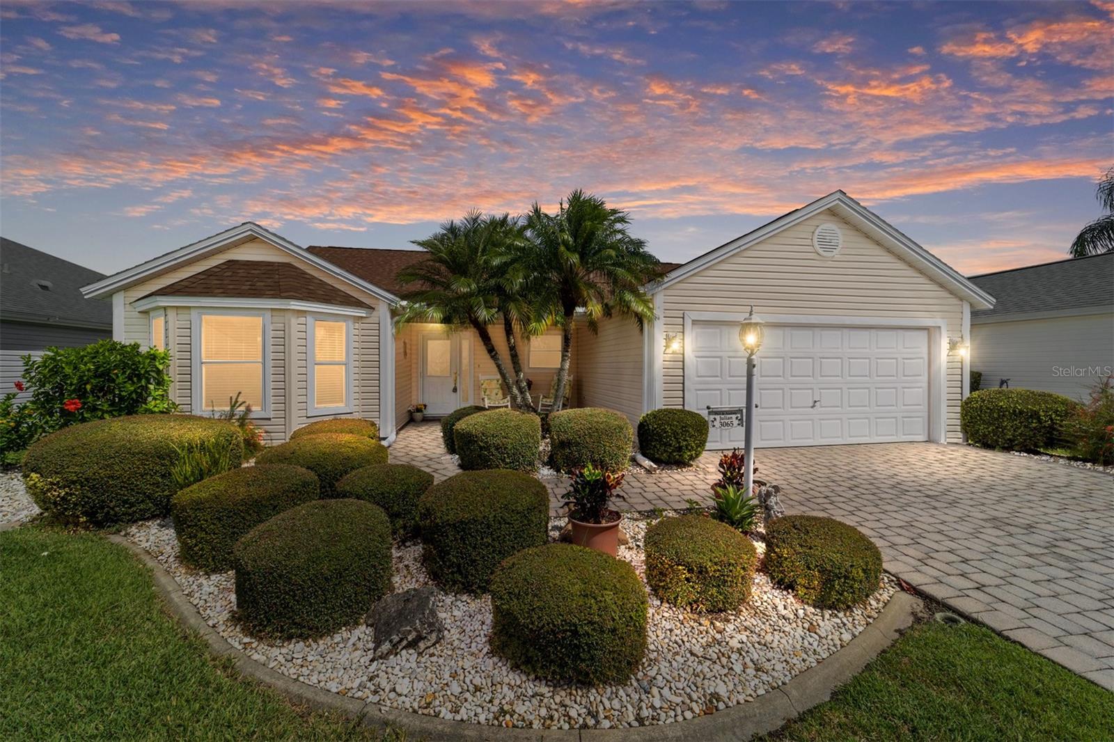 This well-maintained 3 bedroom, 2 bath, CYPRESS model in the Village of Glenbrook offers a spacious, thoughtfully designed layout just minutes from Glenview Country Club, Savannah Center, and Lake Sumter Landing. Enjoy peace of mind with recent mechanical updates including a 2019 ROOF, 2018 HVAC, and 2022 WATER HEATER, plus the added benefit of NO BOND.
Inside, luxury vinyl plank flooring runs through the main living areas, complemented by carpet in the bedrooms. The open kitchen features classic white cabinetry and ample storage, flowing seamlessly into the dining and living areas for easy entertaining. The spacious primary suite includes TWO WALK-IN CLOSETS and a beautifully updated en-suite bath with a TERRA STONE SHOWER complete with bench, TERRA STONE vanity top, and white cabinetry.
A generous 2-CAR GARAGE provides plenty of room for vehicles and storage. Enjoy Florida living year-round on the inclosed lanai, with mature landscaping offering a touch of privacy. Ideally located near golf, shopping, dining, and recreation—this home delivers both comfort and convenience in the heart of The Villages.