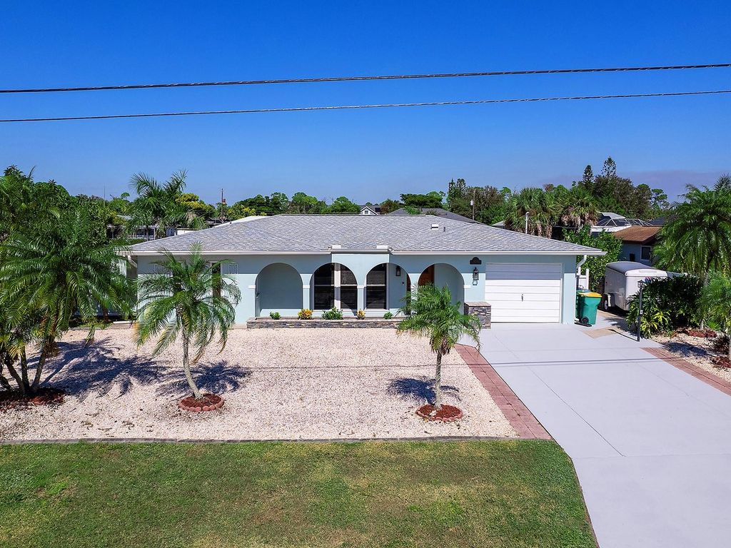 Photo of 18302 Burkholder Circle, Port Charlotte, FL 33948 (MLS # N6142090)