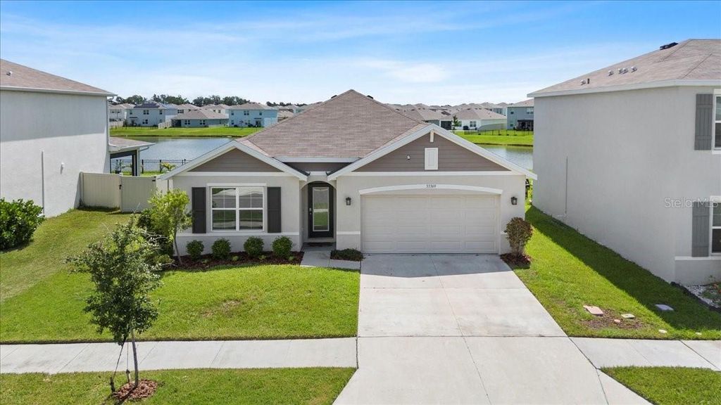 Photo of 33369 Hamilton Hill Lane, Wesley Chapel, FL 33545 (MLS # TB8401520)