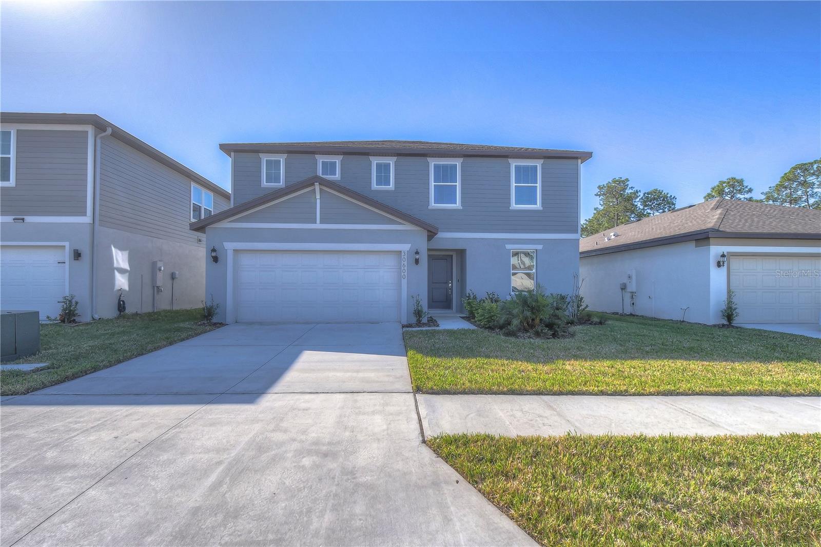 A beautiful place to call home, this house in Wesley Chapel is like new. Located in the Wesbridge community, it will captivate you with its charming landscaping and spectacular location, just steps away from elementary to high schools, making it very convenient for families with school-aged children. Wesley Chapel District Park is less than 2 miles away, offering opportunities for outdoor exercise and various sports activities. Just 8 miles away, you'll find the Premium Outlets with endless options for dining, shopping, and entertainment, as well as The Shops at Wiregrass, The Krate, and other interesting activities just minutes away. The location will undoubtedly enchant you.
This beautiful 5-bedroom, 3-bathroom, 2-car garage home with 2,386 square feet is perfect for a family and a lucky pet. It offers many impressive features, starting with high ceilings. Upon entering, you'll be greeted by a spacious foyer that gives the house a bright and open feel. To the right, you'll find the first bedroom, which can also be used as an office, and a full bathroom. To the left are the stairs leading to the second floor, where you'll be welcomed by a large space that can be used as a family room. The hallways will take you to the master bedroom and the other three bedrooms. Stepping into the backyard, you'll find a serene pond where you can enjoy Florida's beautiful sunsets.
Tenant is required to obtain and maintain renter’s insurance throughout the lease term, as mandated by the landlord. Proof of coverage must be provided before move-in.